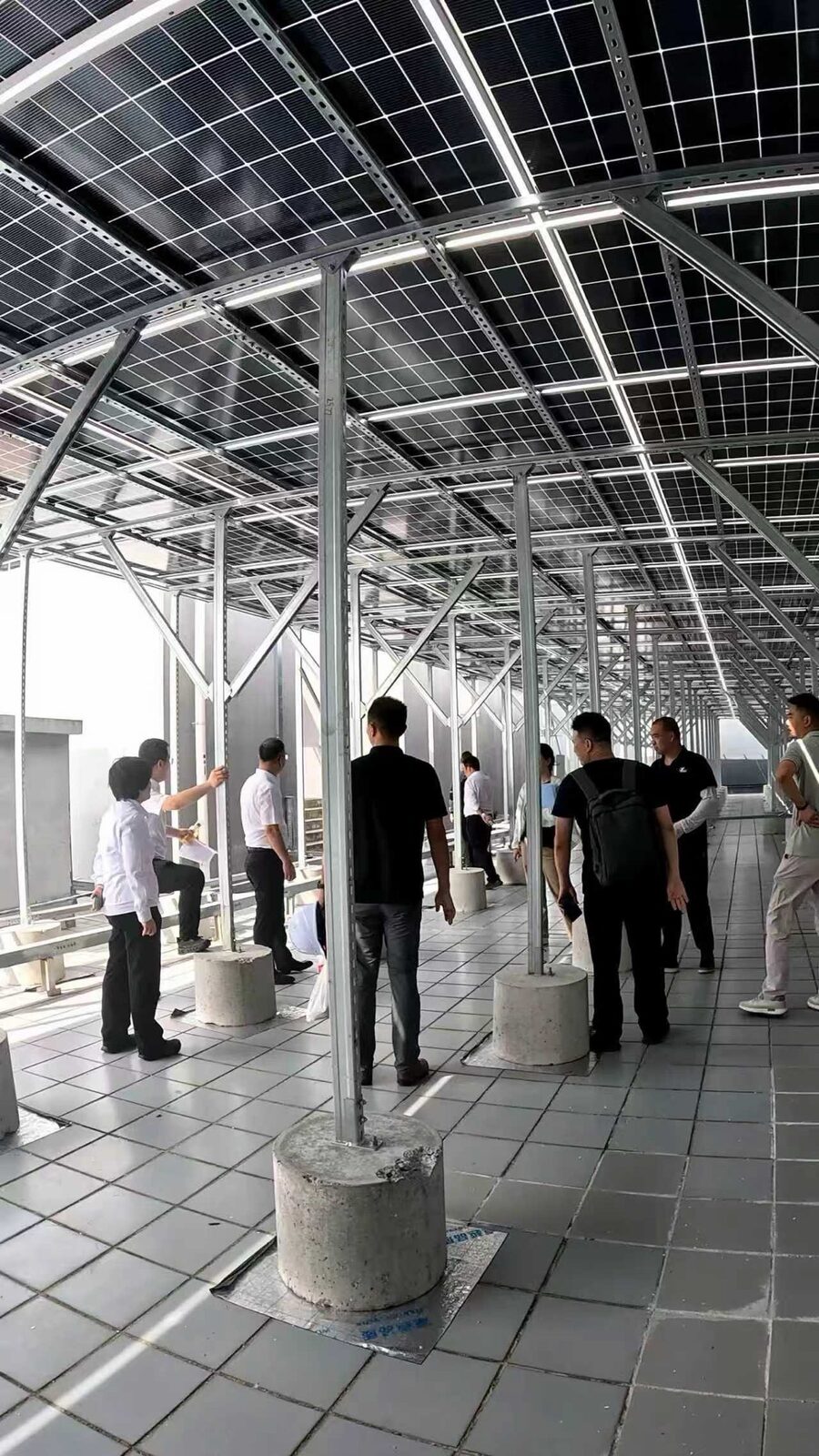 Visitors under the solar carport